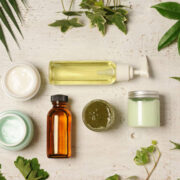 arrangement of natural herbal cosmetics on wooden background